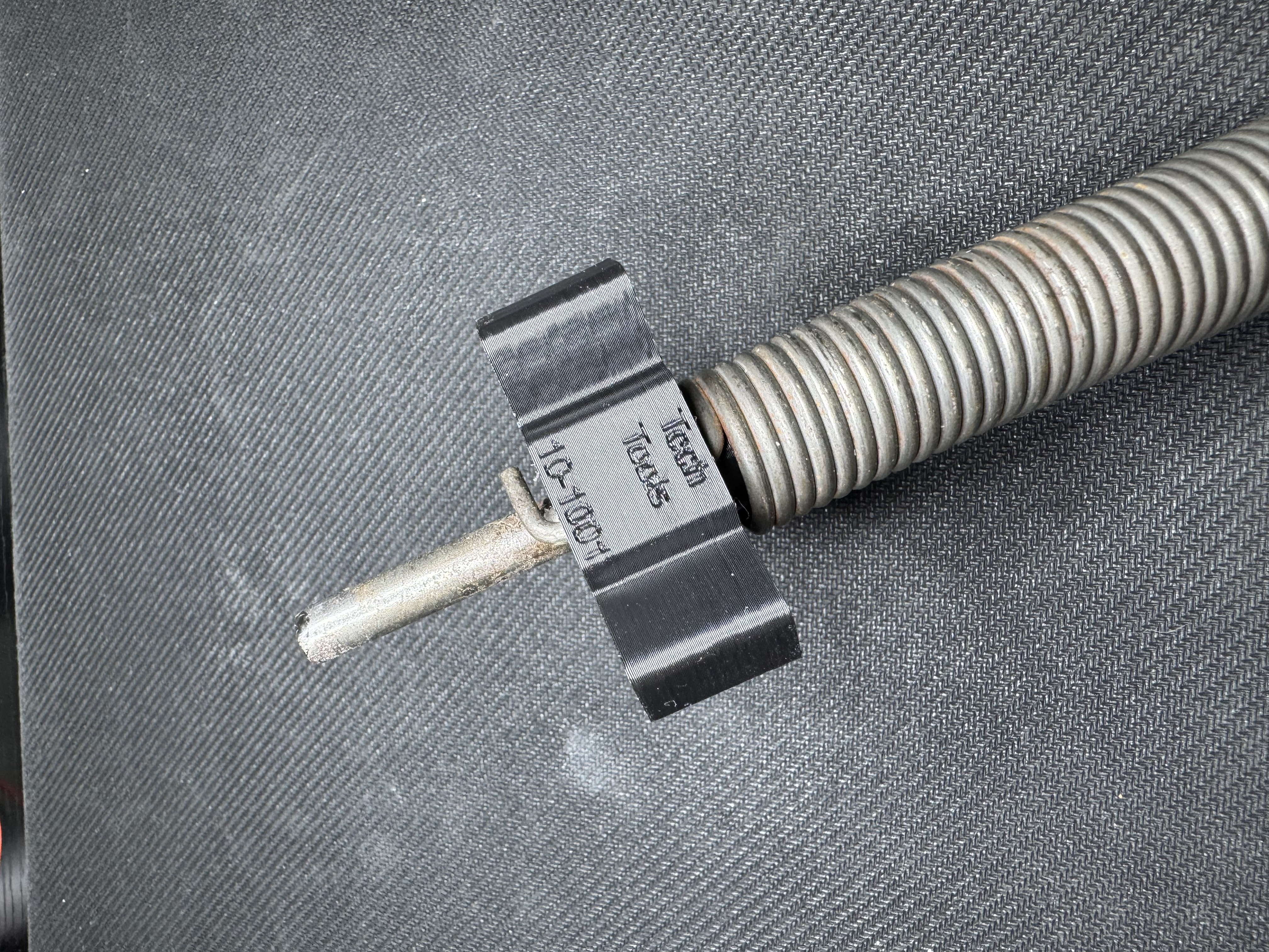 Spring catch back side